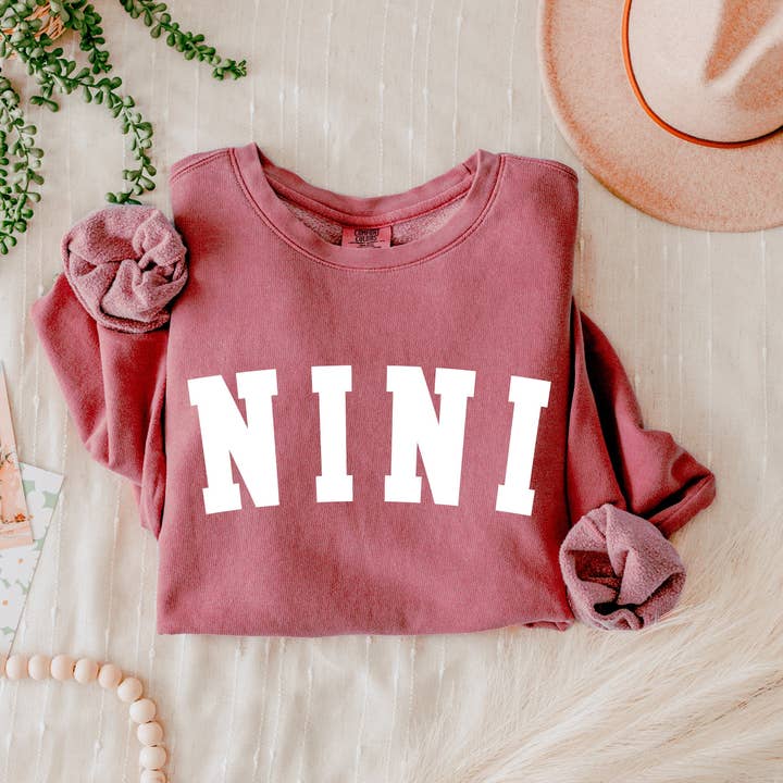 Nini Grandma Garment Dyed Comfort Colors Sweatshirt and other Purchase Wholesale supermercado nini. Free Returns & Net 60 Terms on Faire trending on Faire.