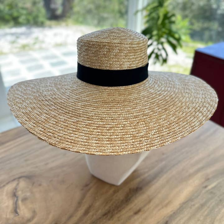 Oversized brim flat top boater hat made of fine braided whea for wholesale by One and Only Accessories
