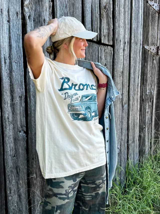 Ivory Driven By Faith Bronco Tee for wholesale on Faire2