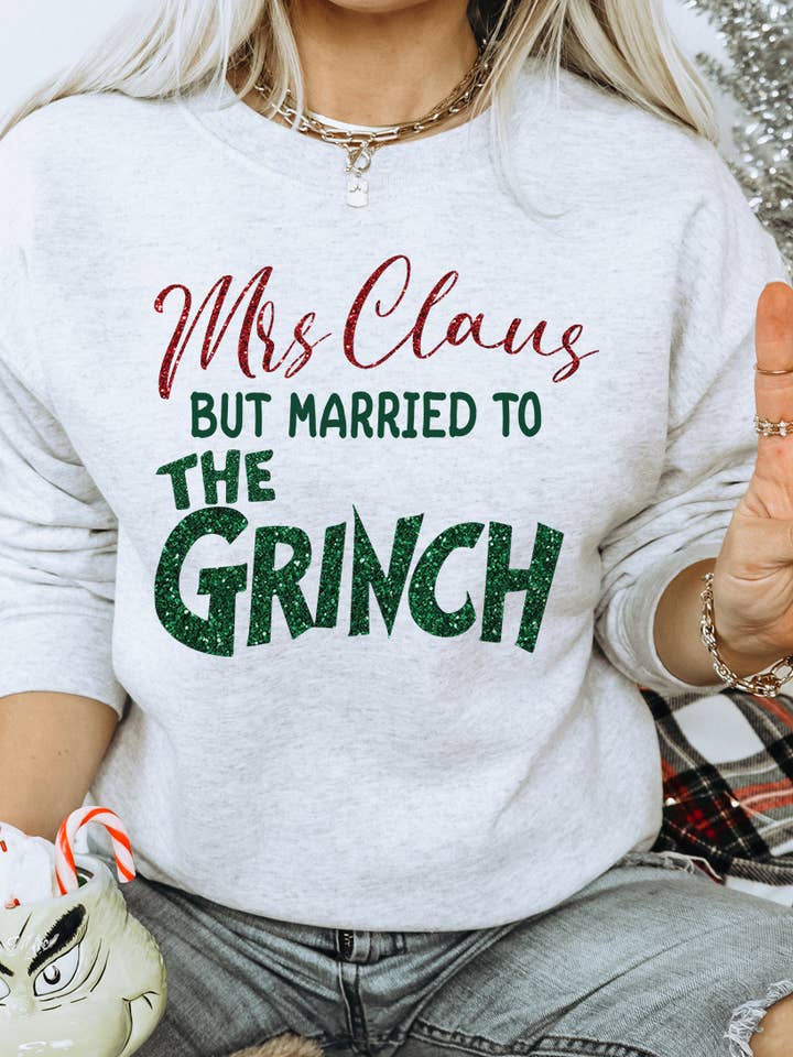 Ash Mrs. Claus But Married To The Grinch - Christmas Sweatshirt for wholesale on Faire