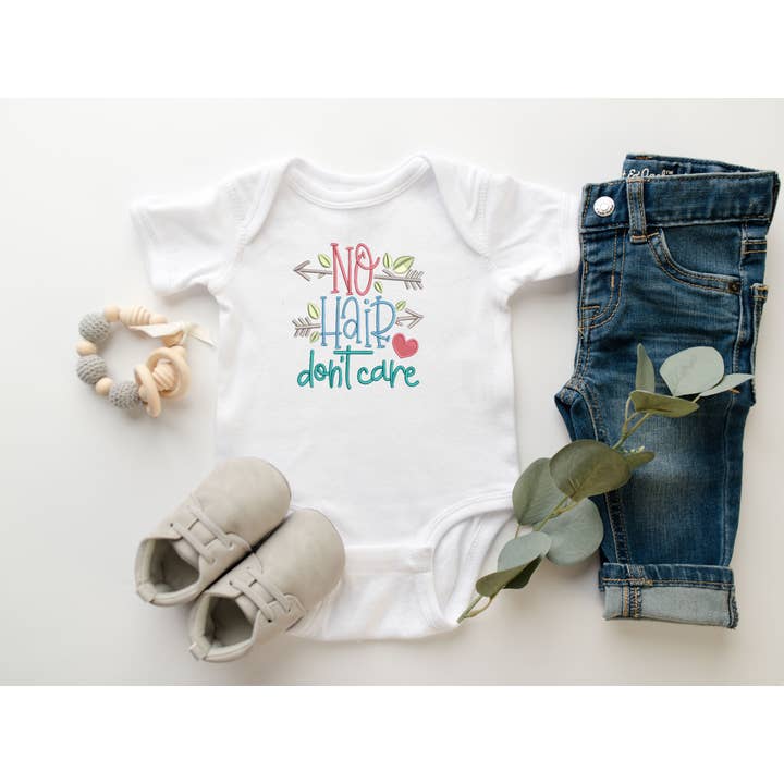 No Hair Don't Care Embroidered Baby Bodysuit for wholesale by Cordelia Rae