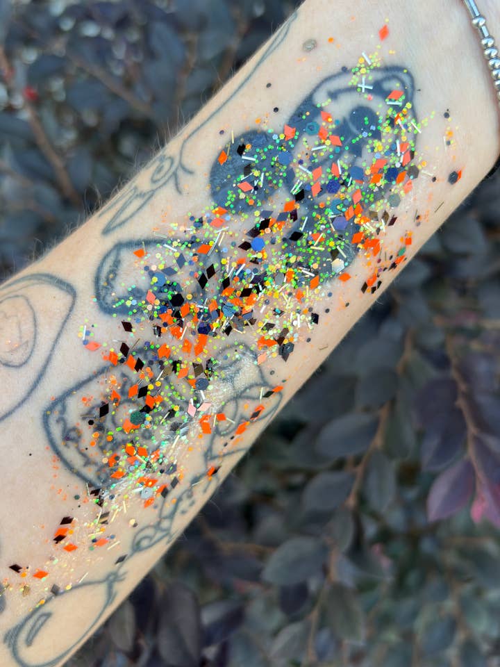 Black Orange and Iridescent Orange Face and Body Glitter Gel for wholesale by Nola Glitter Goddess