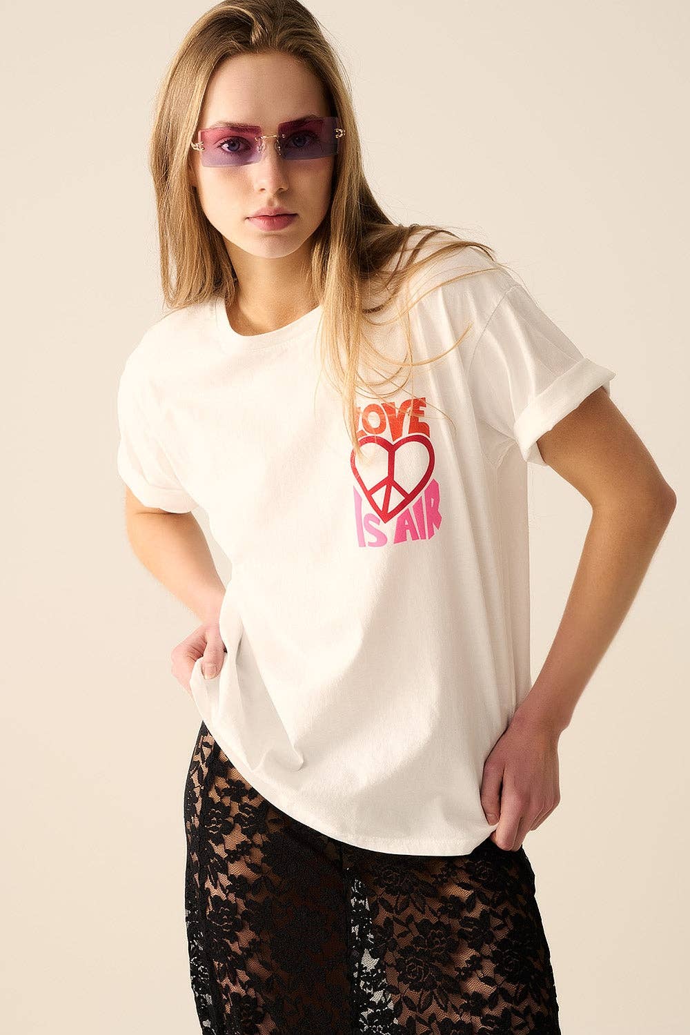 White T-Shirt with Love is Air and Heart with Peace logo for wholesale on Faire1