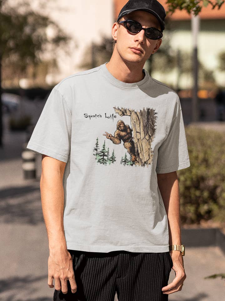 Squatchin’ Country - Wholesale T-Shirt (Graphic) - Unisex - Squatch Life Rock Climbing Bigfoot grey t-shirt