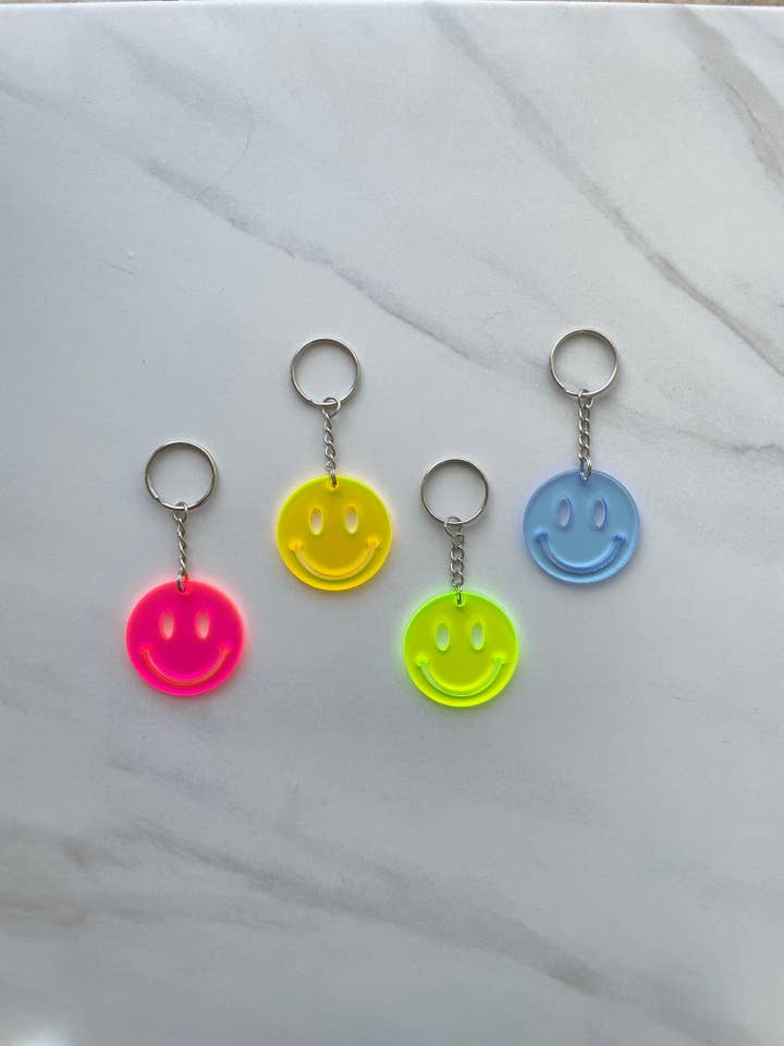 Smiley Face Keychain Happy Pastel Neon Iridescent Gift for wholesale by The Oath Collective