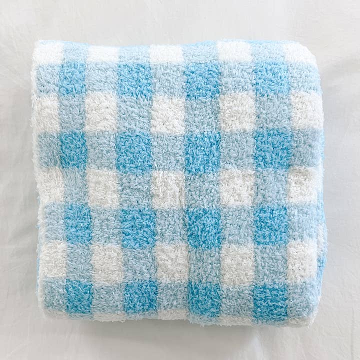 Couverture en peluche à carreaux pour la vente par love + wild