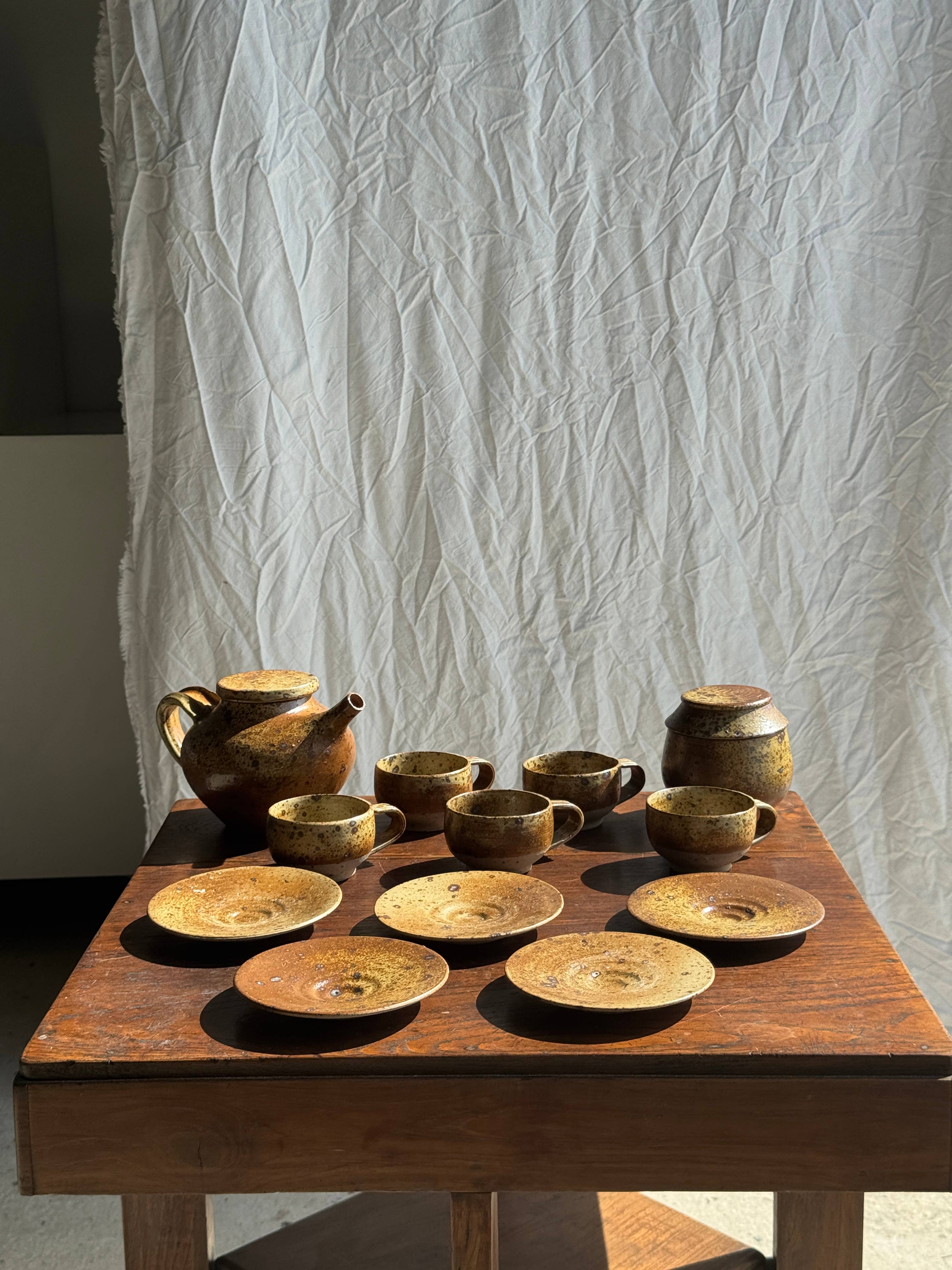 brown Small stoneware tea set with teapot, cups, sugar bowl for wholesale on Faire1