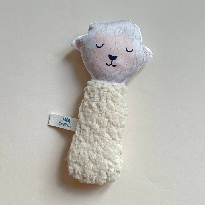 Rattle Gling Gling Mouton Teddy beige for wholesale by Carotte & Cie