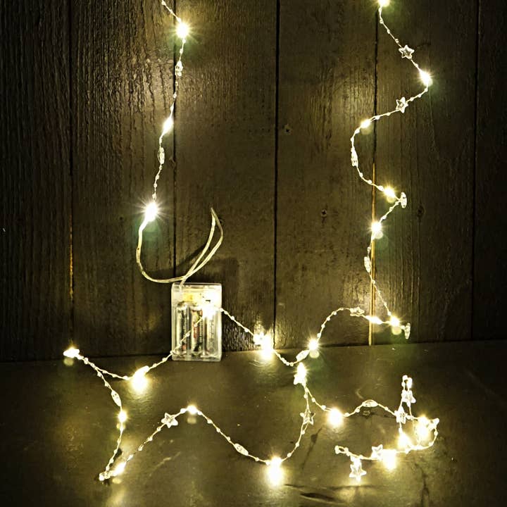 Holiday Depot Inc. - Wholesale String Lights - M9602- LED Star string light, 50lts, 5m length - Warm white6