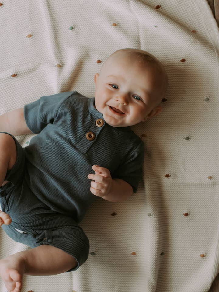 Pastel blue ribbed bamboo short evolving onesie for wholesale by Kim & Joe