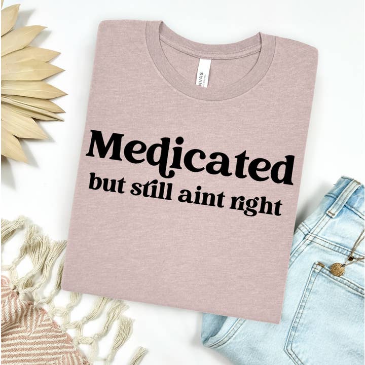 Medicated But Still Ain't Right Graphic Tee for wholesale by Festivitees