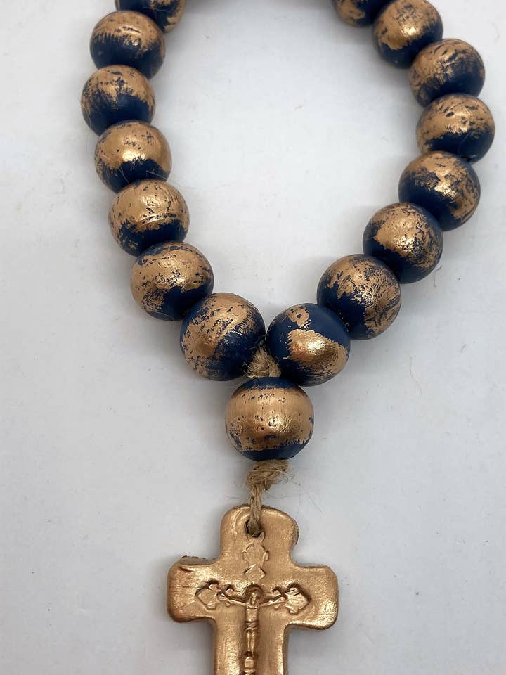 Navy Blue With Gold 19 Wood Bead With Small Clay Cross for wholesale by RKM Designs