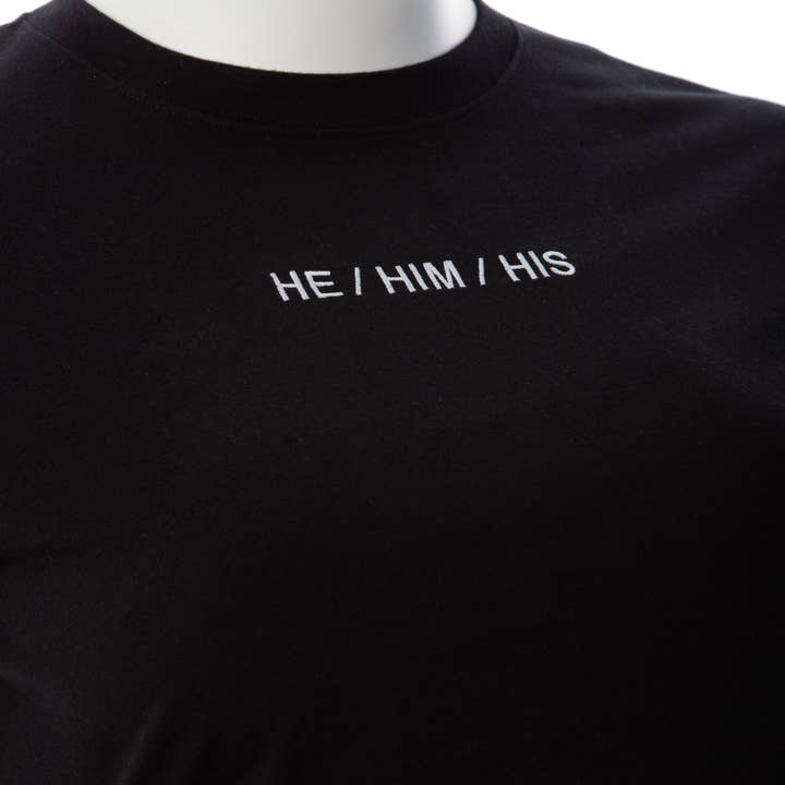 Gender Fluid Pronoun Tee | He, Him, His (Black) for wholesale by Voodoo