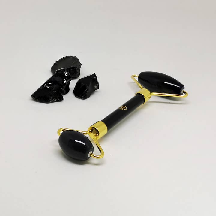Black Obsidian Face Massage Roller | Restorer & Anti-Blemish for wholesale by YA BEAUTY