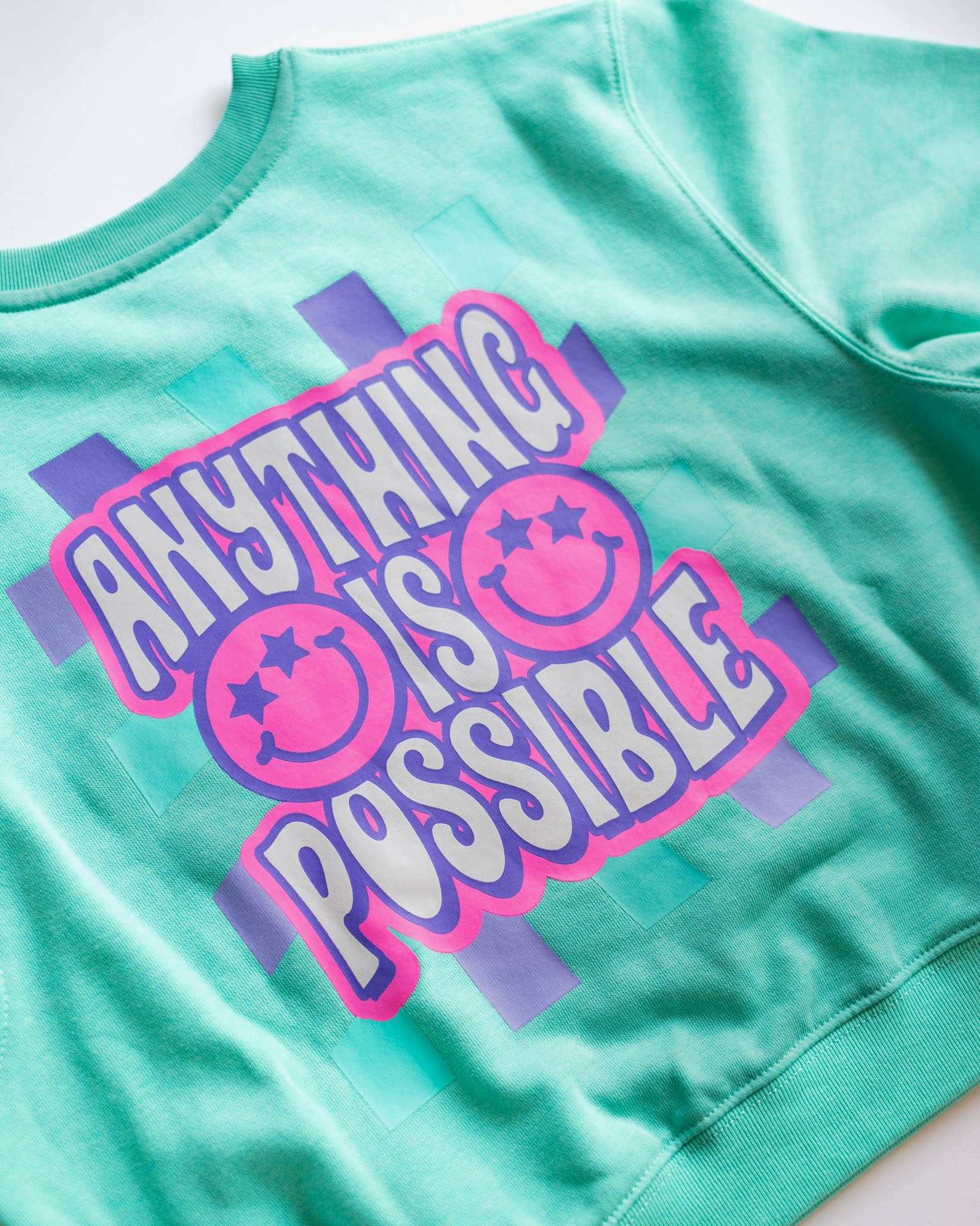 XOXO by magpies - Venta al por mayor Sudadera - Niños - Sudadera Sonriente "XOXO by Magpies Anything is Possible" | Aqua7