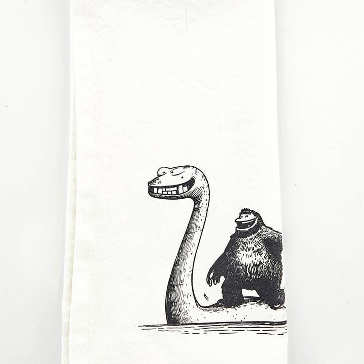 Sasquatch Riding Loch Ness Monster Tea Towel for wholesale by Allegheny Outfitters