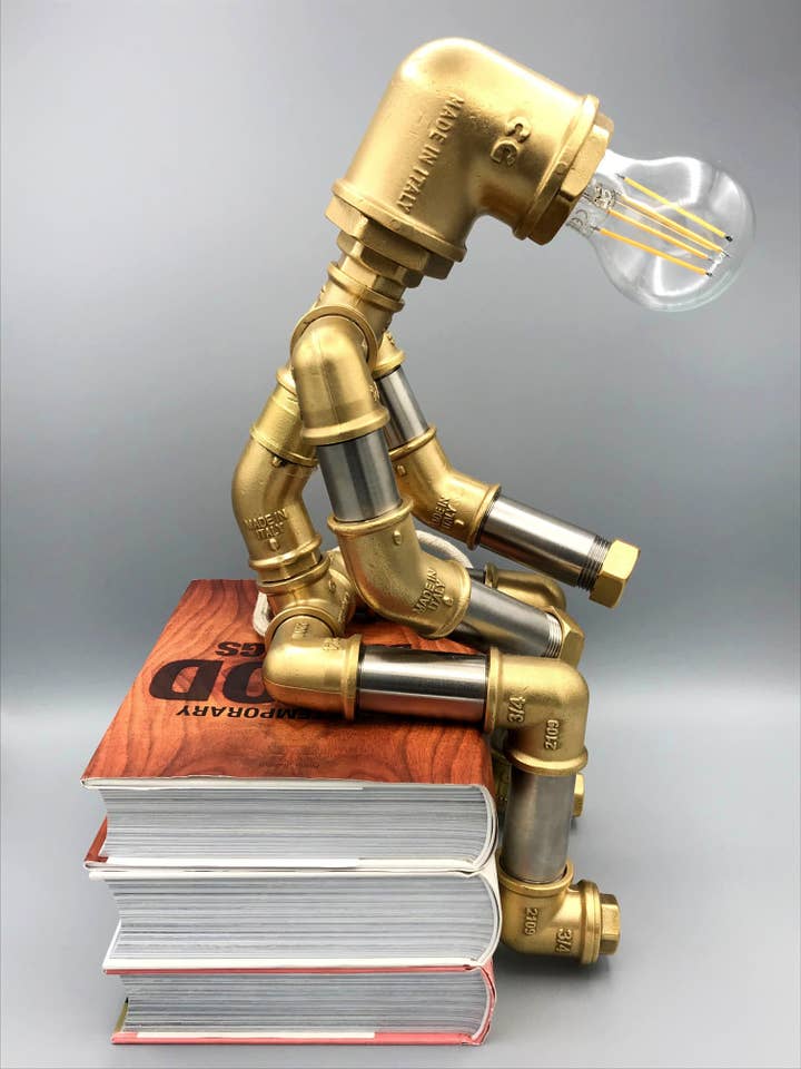 Lámpara pipe minimalista Jens de acero inoxidable y latón, ajustable 360° para venta al por mayor de Lmpmn