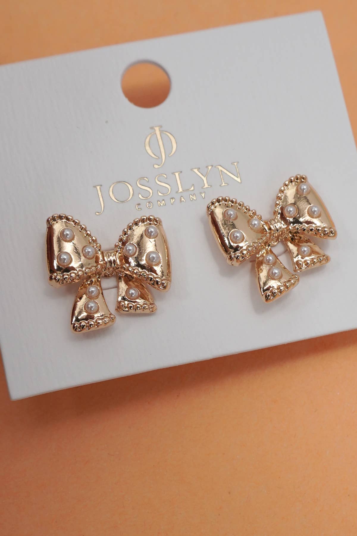 Goud OORSTEKERS MET STRIK | 31E24883 voor groothandel op Faire2