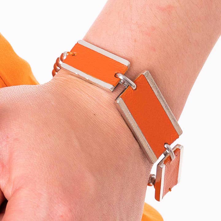 Bracelet rectangulaire en cuir et boule en acier orange pour la vente par Sobo & Co Jewellery