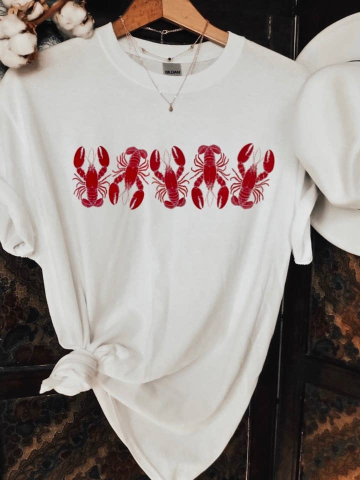 Transfert des petits homards pour la vente par Axle Rose Co