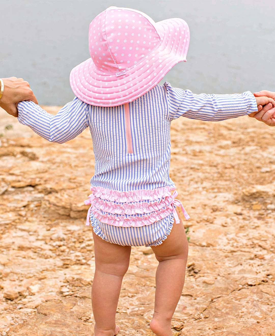 RuffleButts + RuggedButts - Wholesale Rashguard - Baby - Baby Girls Periwinkle Blue Seersucker Long Sleeve One Piece Rash Guard Swimsuit with Signature Rear Ruffles6