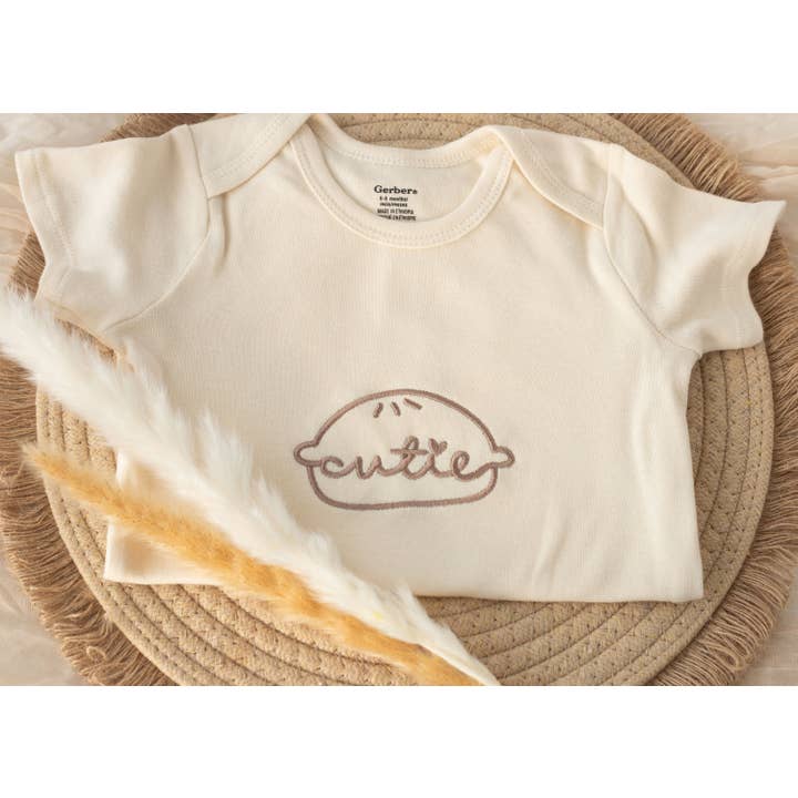 Embroidered Cutie Pie Onesie® and Tshirt for Newborns for wholesale by Nunu's Studio