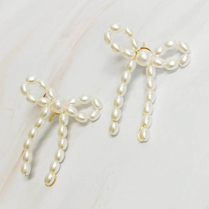 Pearl Bow Ballerina Earrings for wholesale by FARMASI & Just Believe Boutique Wholesale