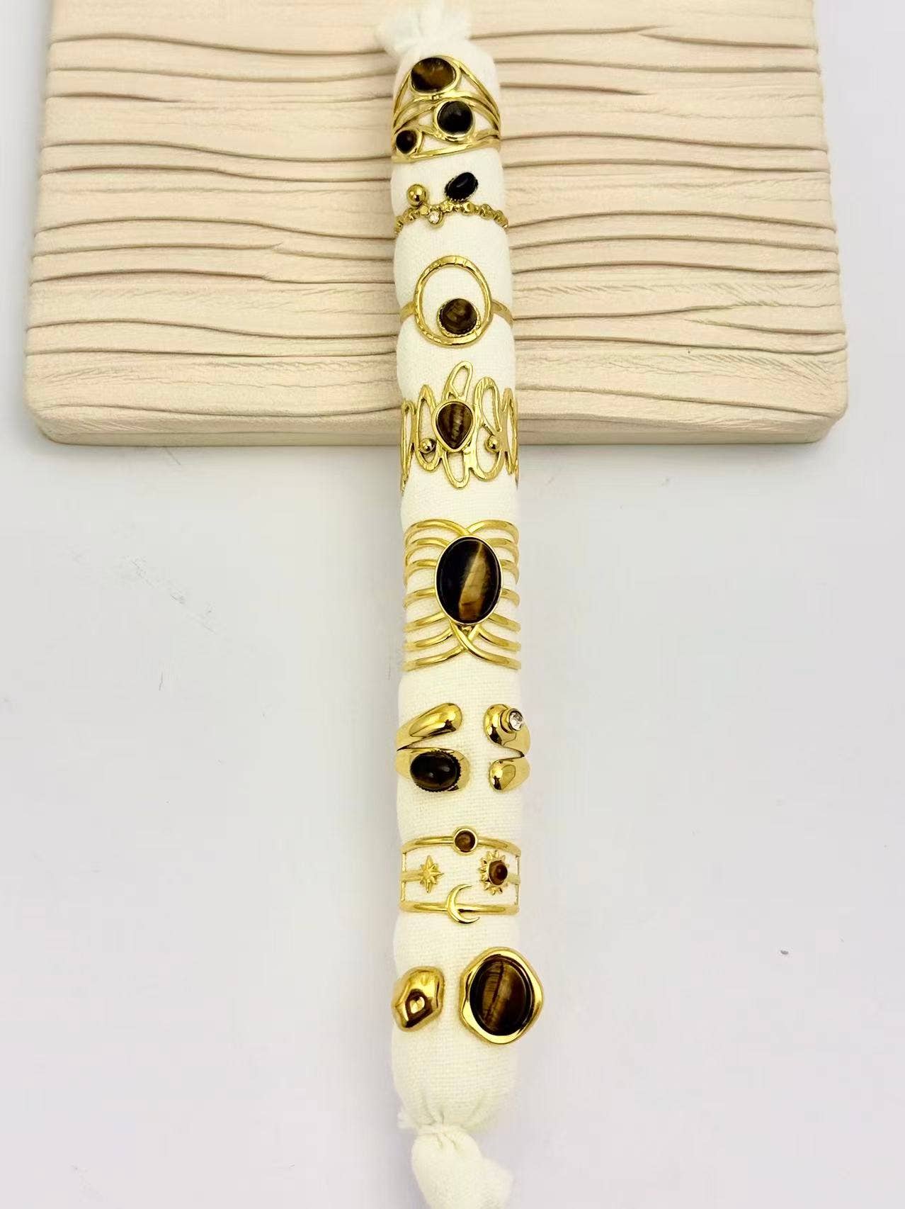 COSMOS - Wholesale Jewelry Set - Set of 8 rings adorned with natural Tiger's Eye stone1