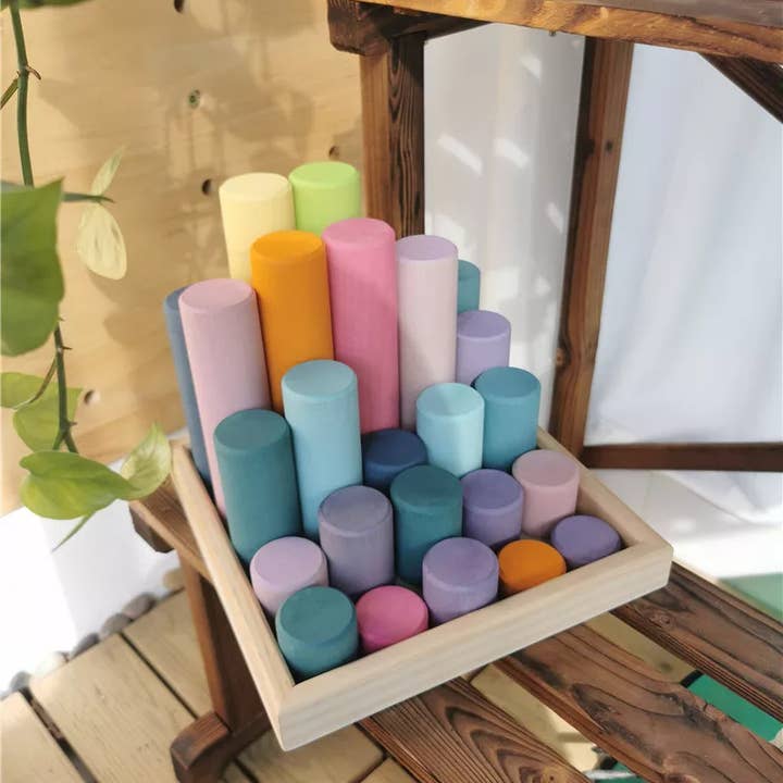 Juego educativo de cilindros apilables en tonos pastel para venta al por mayor de Tinitastic