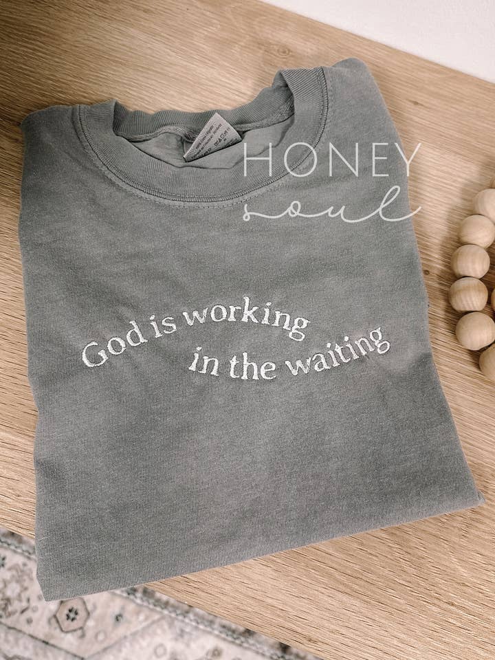 Embroidered God Is Working In The Waiting Tee for wholesale by Honey Soul LLC