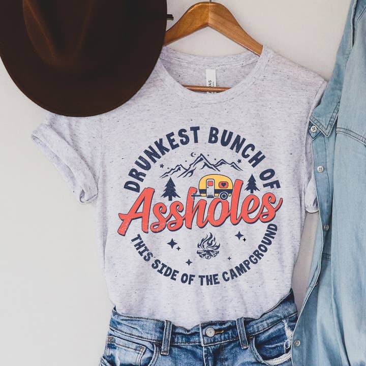 DRUNKEST BUNCH OF ASSHOLES ON THIS SIDE OF THE CAMPGROUND GRAPHIC TEE for wholesale by Haverly and Co.
