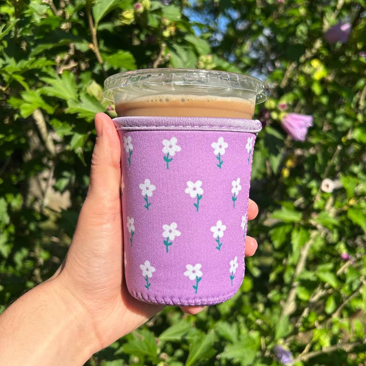 Sun and Mind Co. - Wholesale Drink Huggers & Koozies - Purple and White Flower Field Iced Coffee Drink Sleeve