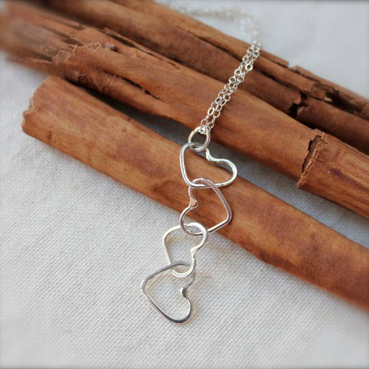 Linked Hearts Silver Necklace for wholesale by Kitty Stoykovich Designs