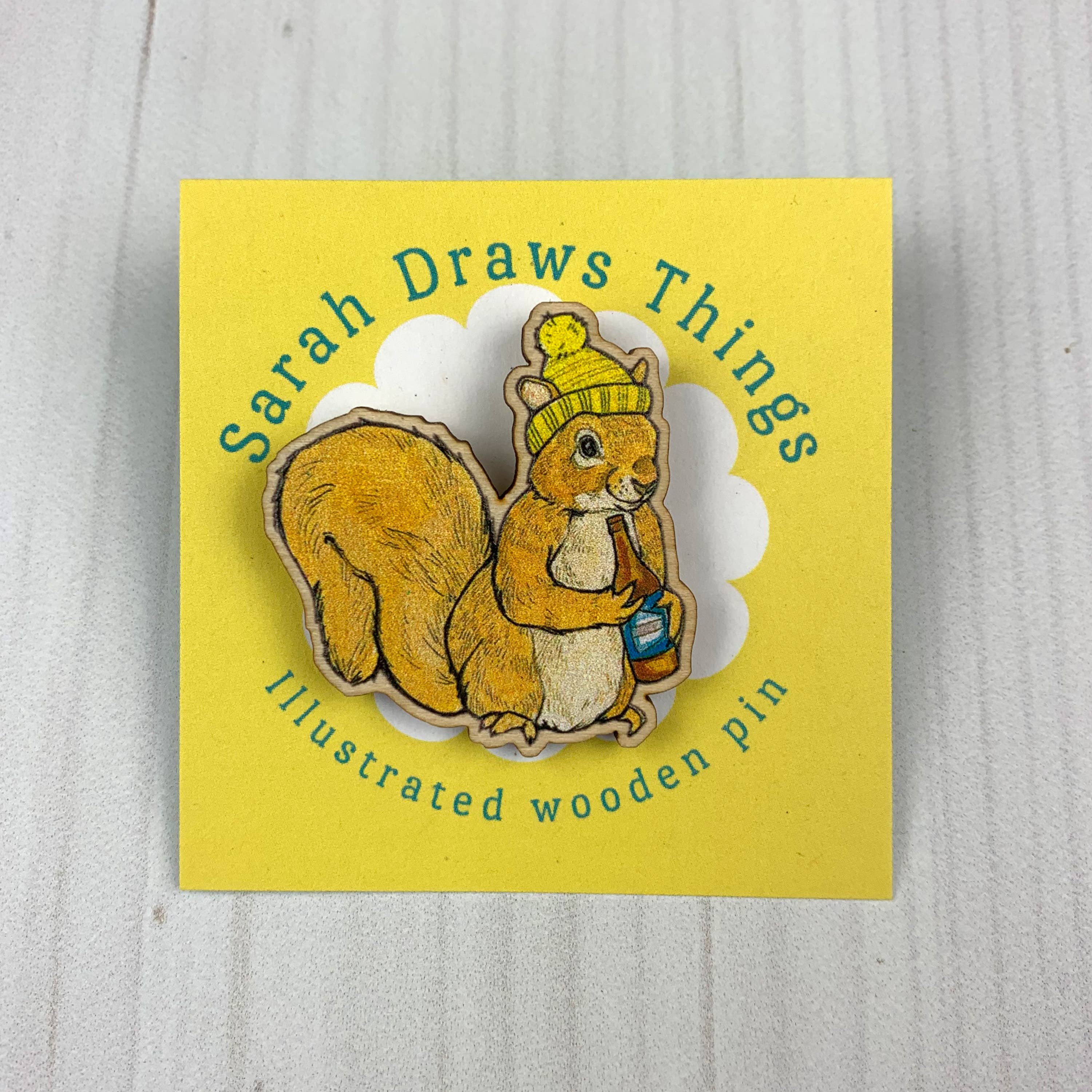 Sarah Draws Things - Wholesale Lapel Pin/Button - Beer Squirrel - 1.5" illustrated wooden pin