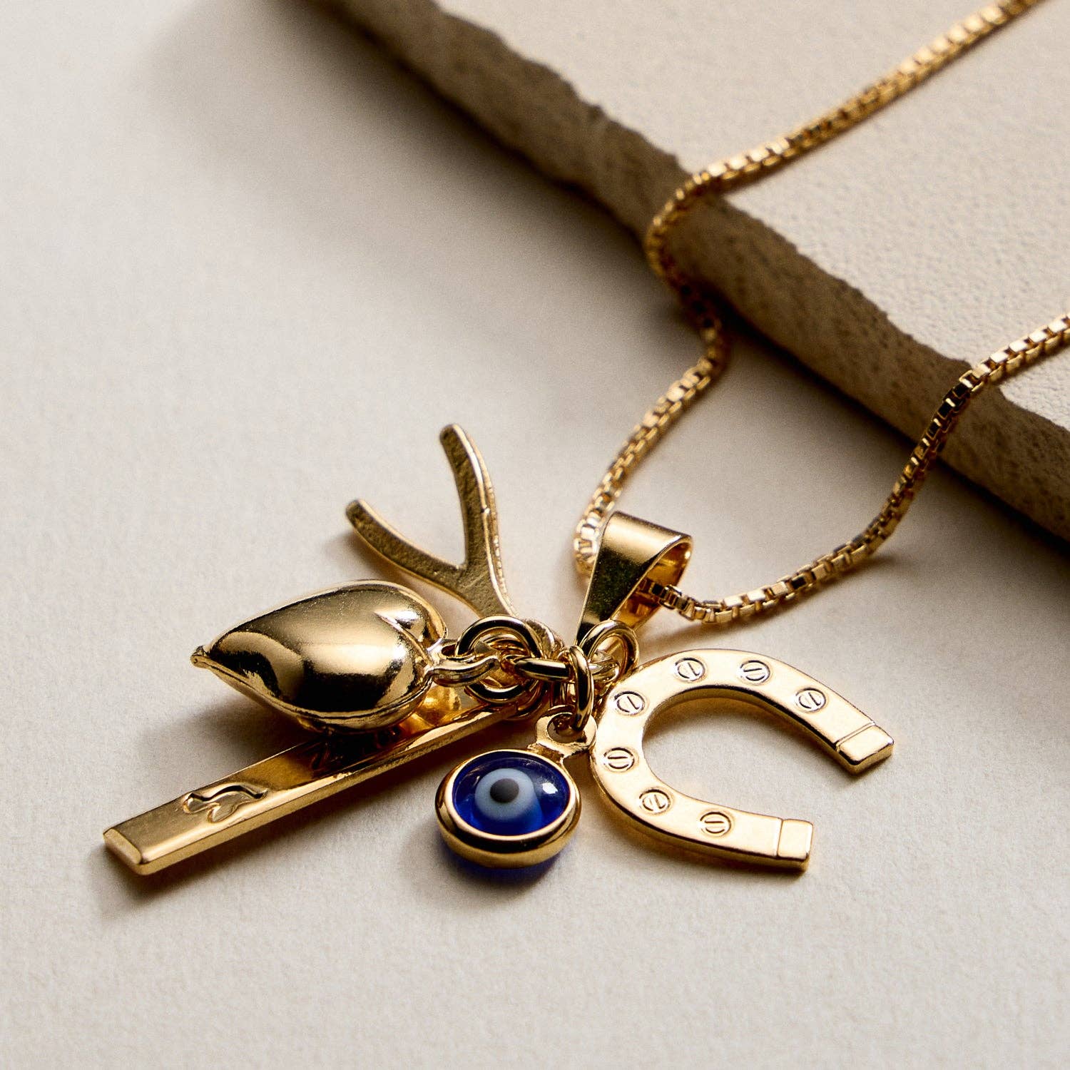 GD Gold Filled Charm Necklace – Heart, Horseshoe, Evil Eye & Wishbone Pendant for wholesale on Faire0