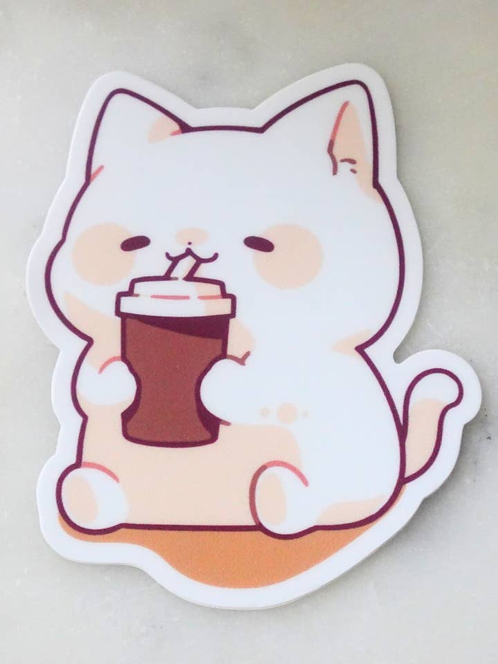 Kat, der nipper til kaffe for engroshandel hos MPB Stationery