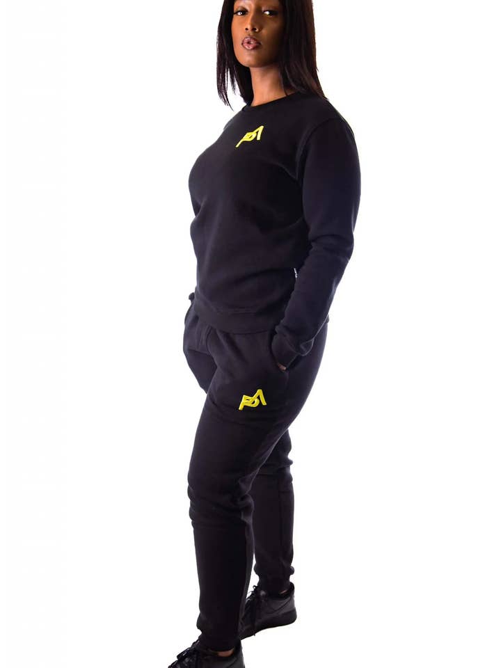 Effen Joggerset Valette Zwart & Geel Unisex voor wholesale door PlainAmstrdm