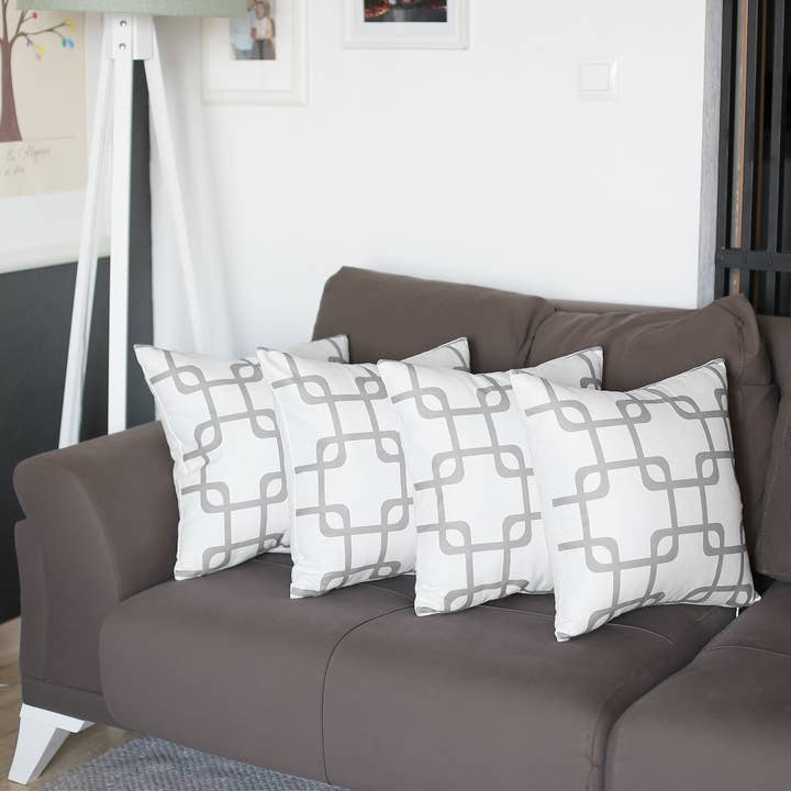 Kissenbezug mit geometrischem Überwurf, 4er-Set für den Großhandel von MIKE & Co. NEW YORK