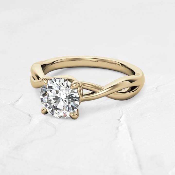 DJOYR - Wholesale Engagement ring - Round Infinity Style Moissanite Solitaire Ring in 14K Gold1