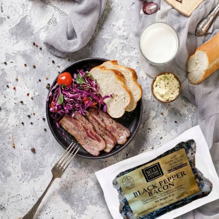 Thick-Cut Black Pepper Bacon: Spicy, Maple-Cured Flavor for wholesale by MeatCrafters Inc.