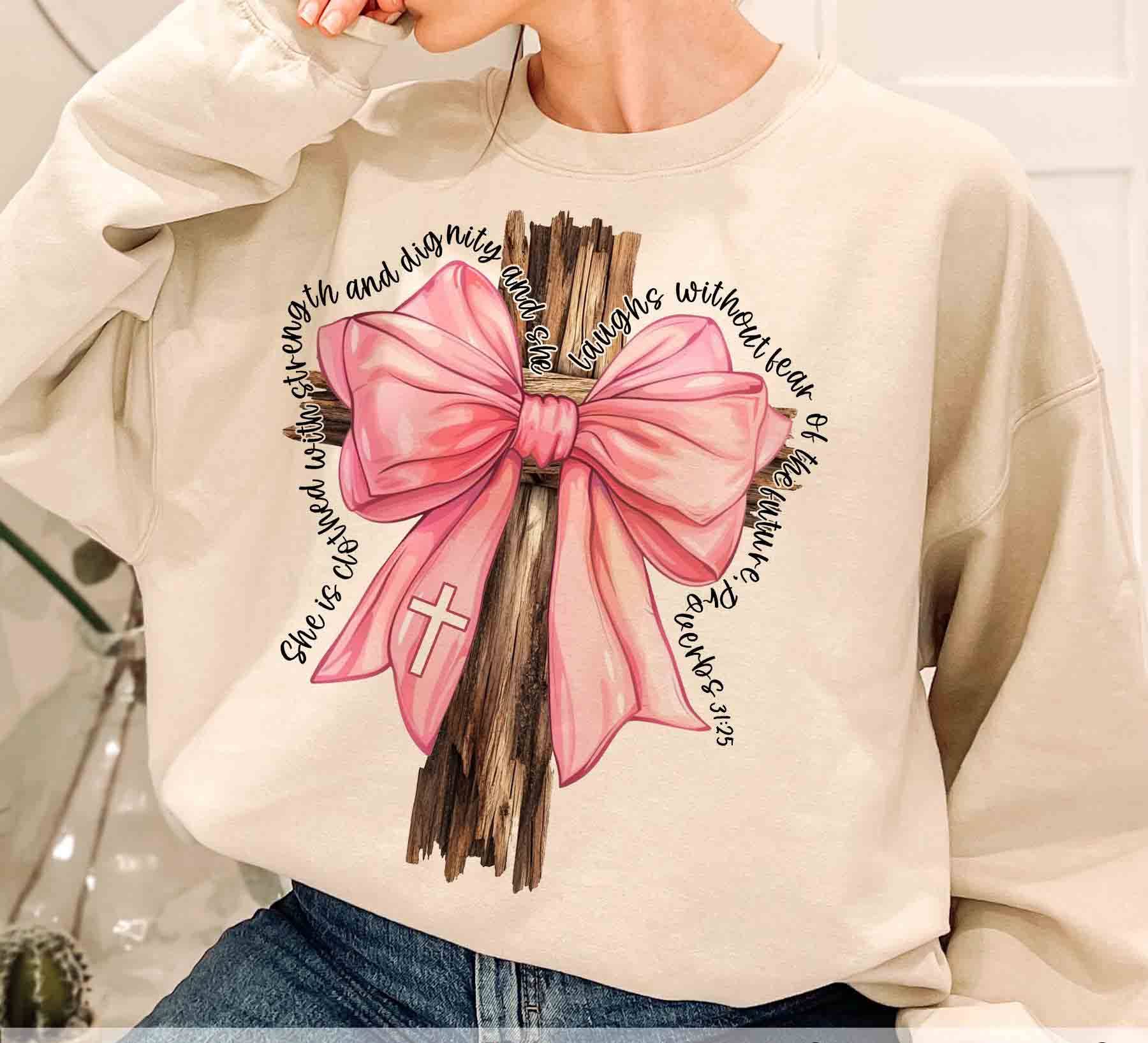 NVC Ecommerce LLC - Wholesale Graphic Sweatshirt - Women's - Proverbs She is Clothed with Strength Sweatshirt, T-Shirt1