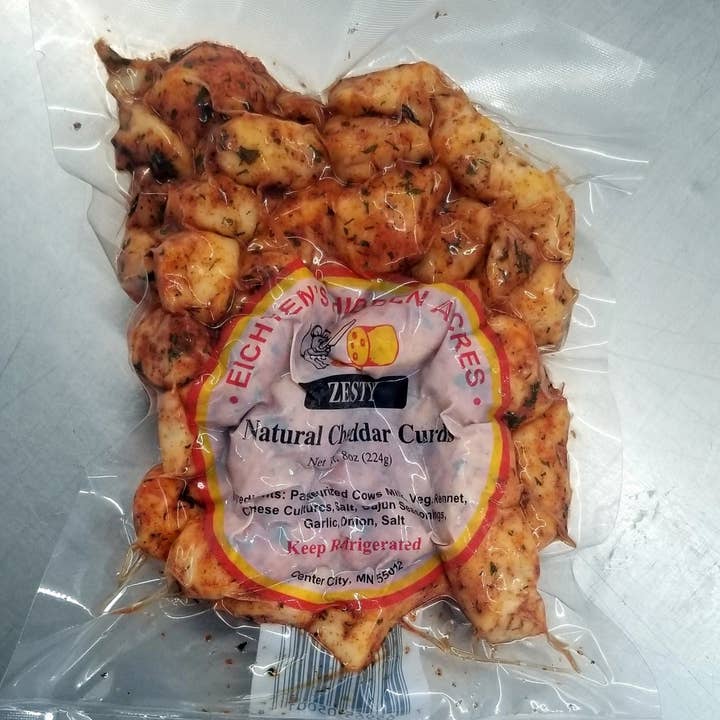 Cheese Curds, White with Zesty Seasoning 8 oz for wholesale by Eichtens Cheese