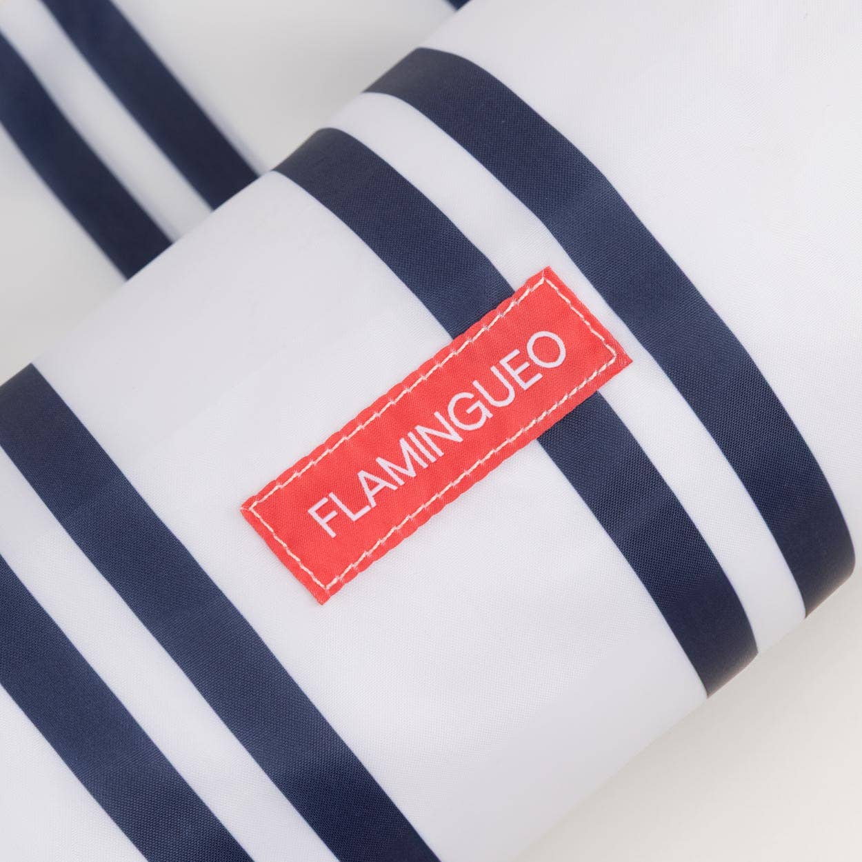 Flamingueo - Wholesale Beach Accessories - White inflatable floating armchair with blue stripes1