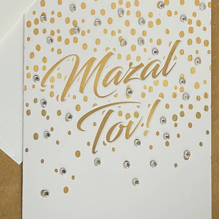 Mazal Tov with Gold Confetti for wholesale by Russell Jeffery Design by Off By Heart Design