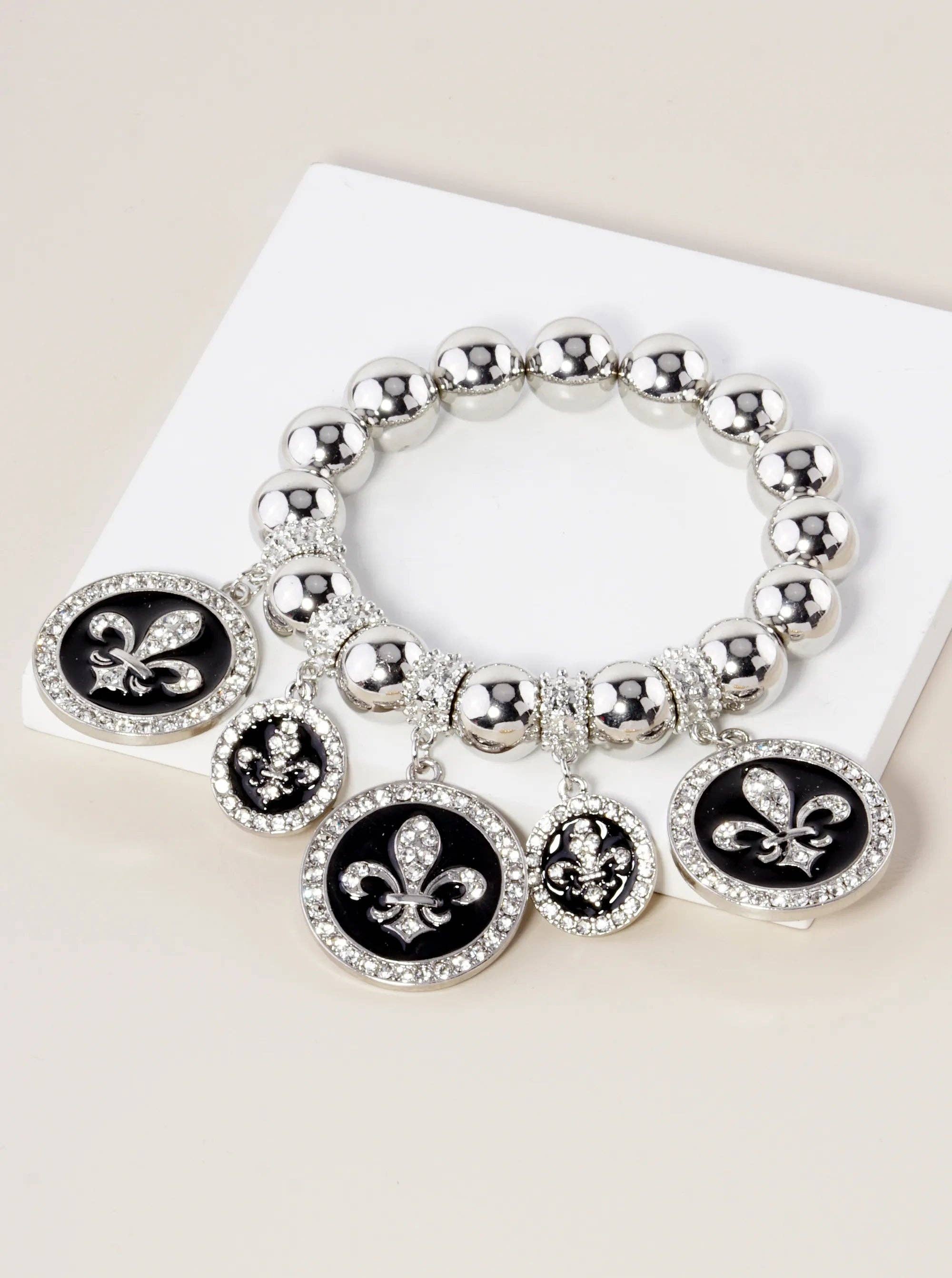 Wild Honey - Wholesale Charm/Dangle Bracelet - New Orleans Saints Fleur De Lis Rhinestone Stretch Bracelet0