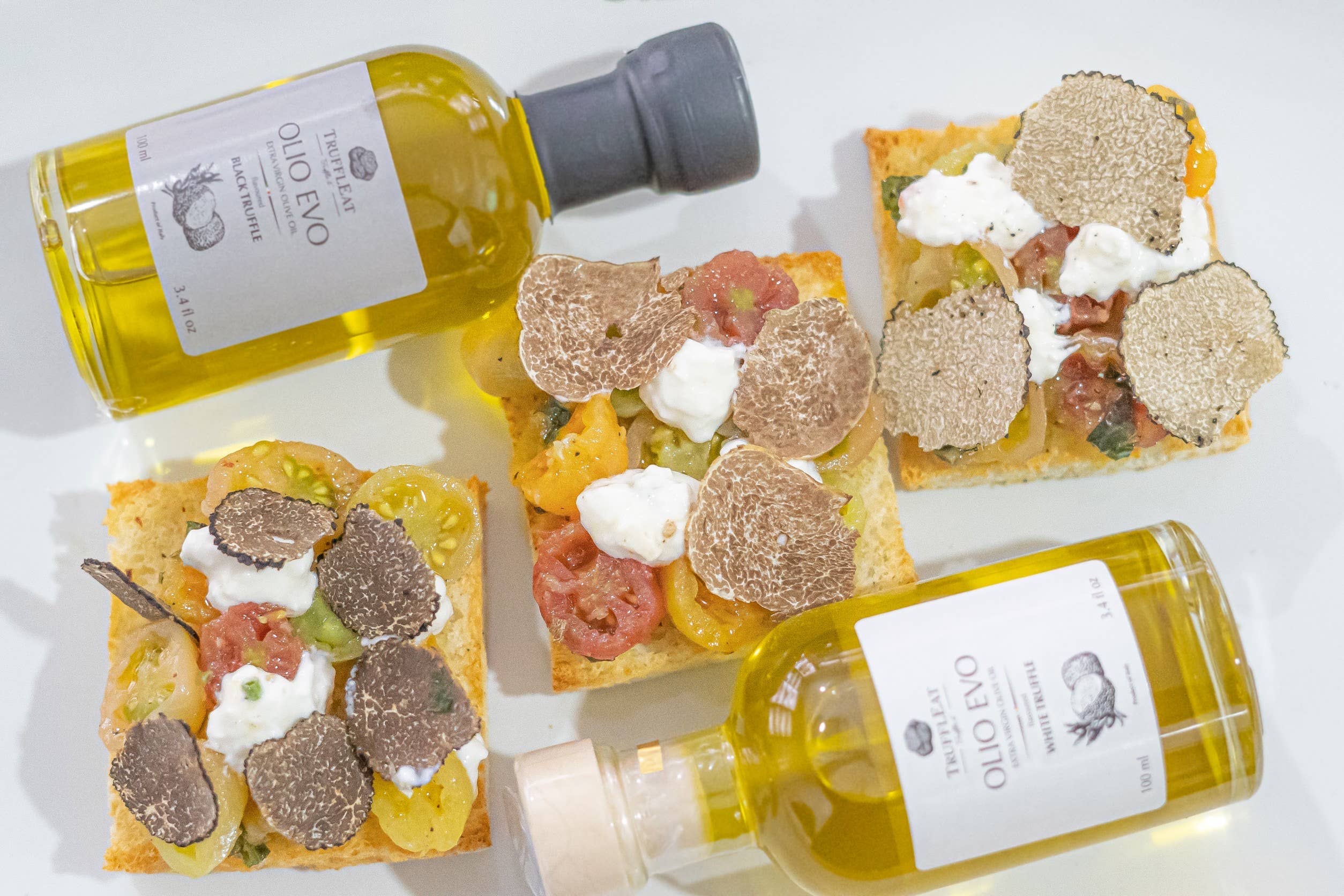 Truffleat srl - Vendita all'ingrosso Olio d'oliva - Olio extra vergine di oliva al tartufo bianco Made in Italy0