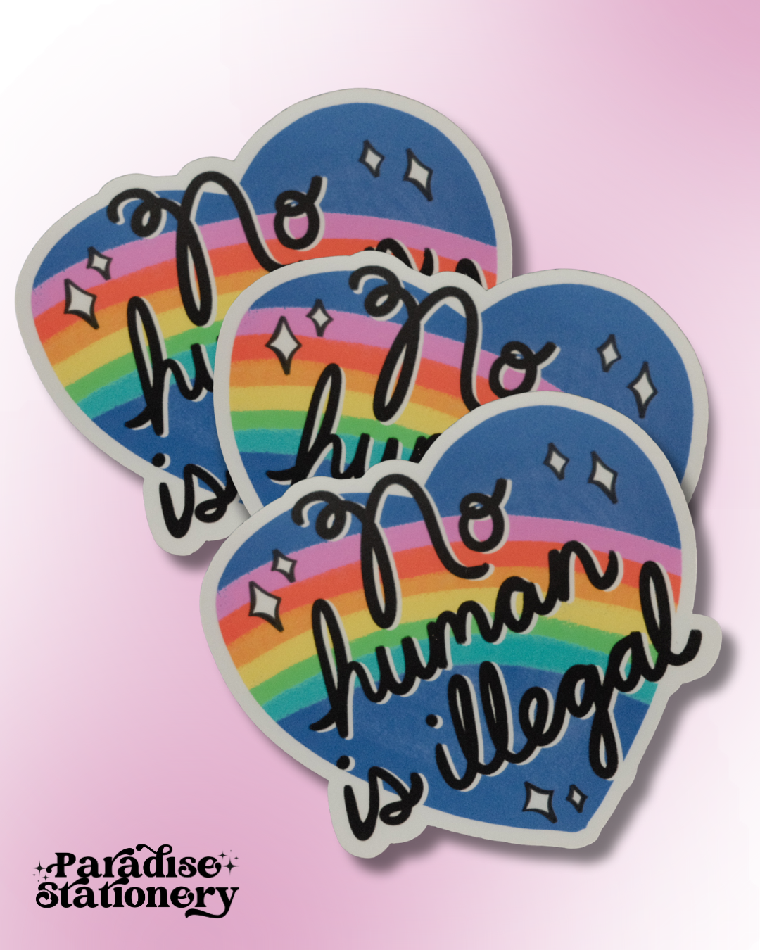 Paradise Stationery LLC - Wholesale Sticker - "No Human Is Illegal" Rainbow Heart Sticker0