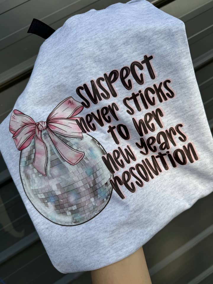 Suspect never sticks to her New Year’s resolutions tee & sweatshirt for wholesale by Gunpowder and lace wholesale