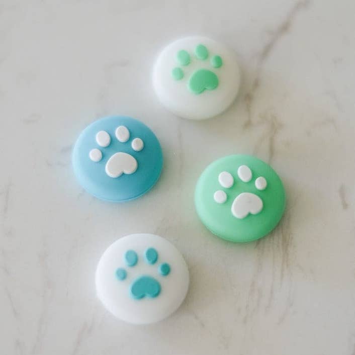 Blue & Green Paw Thumb Grips (2 Sizes Available) for wholesale by StickieTech
