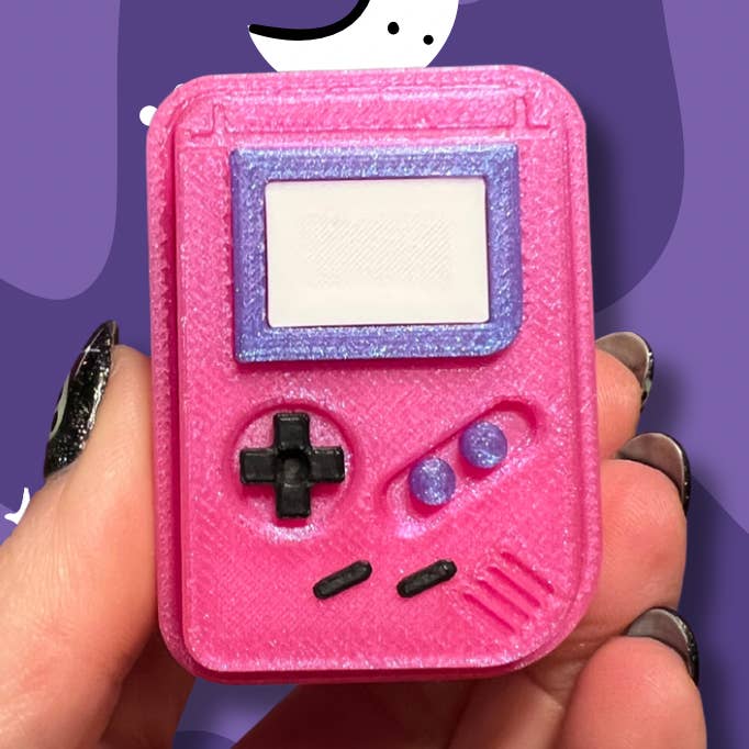 Porte-clés Charme de Sac Jouet Anti-stress Système de Jeu Rose pour la vente par The Foxy Hipster